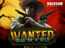 Wanted Dead or A Wild: kowboj z pistoletami na tle dużej księżyca